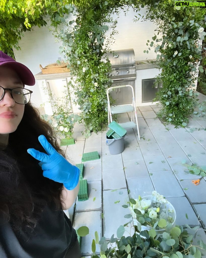 Kat Dennings Instagram - My building of the floral arch! Three days of literal blood, sweat and tears. There was also some broken glass. Shout out to @barbrastreisand and her audiobook for getting me through several breakdowns on the way to the final magical moment 🌿💕