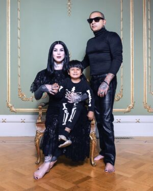 Kat Von D Instagram - Swipe to watch our little family grow older! 🖤 Since Leafar was born, @prayers and I have made it our annual tradition to take a family photo around the same time every year.  Our goal is to fill my collection of  Victorian oval frames we have in a section of our home with a new photo every year, documenting our family growing together — our little spin on The Picture of Dorian Gray. 

It’s gonna be so cool to see this collection of portraits side by side decades from now when we are old and grey and  Leafar will be too big to sit on my lap!