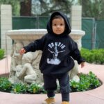 Kat Von D Instagram – Not that long ago, Leafar barely reached the top of this wishing well, and now he’s almost twice it’s height! 🙀 Not a day passes me where I don’t try and soak up every moment with my little one, but I gotta be honest, it’s going by way too damn fast! 🙀