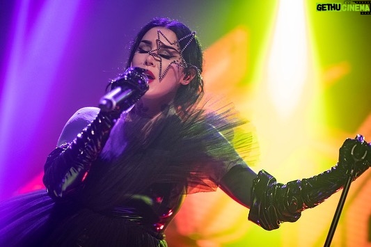Kat Von D Instagram - A few performance shots from the Love Made Me Do It record release party! 🖤 I’m still buzzing over how good it felt to finally share the stage with my amazing bandmates: @sammidoll @mrpharmacist72 @daveparley @brynnroute! Huge thank you to @officialcharo for introducing us on stage, and to all of our friends + family that came to celebrate with us! This party made me even more excited to go on tour soon and do this in an even bigger way! For tickets, click the link in my bio! Because everyone is asking: My star eye piece was made by @awongolding My dress by: @asanchezfashion My shoes: coven buckle shoes by @vondshoes #lovemademedoit The Belasco