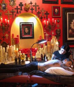 Kat Von D Instagram - As some of you know, we recently purchased a beautiful home on a bit of land in rural Indiana, and the more time we spend out there we realize we feel more at home there than we do here in LA. After much thought, we have decided we will permanently be moving to Indiana at the end of this year. We plan on selling our beautiful home here, and I will most likely open a private studio in Indiana once we are done with the house remodel there. This means that, sadly, I will be closing my beloved tattoo shop @highvoltagetat here in West Hollywood on Dec 1. I didn’t think it would make sense to keep it open if I wasn’t present, and aside from coming back to work on music with my band, we don’t plan on returning to LA very often. With that being said, we will be celebrating the HvT legacy this next month and a half by tattooing regularly at the shop, and welcome all of you to come and get tattooed by one of my talented fellow artists in the month of November! Appointments are booking up quickly, so I suggest either coming by the shop and setting up time, or going to highvoltagetattoo.com and making your appointment! I also strongly suggest following my talented fellow artists to see where they end up going in their journey! I’d like to thank my beloved tattoo family that I’ve had the honor and privilege of working alongside, And a very special THANK YOU to all you wonderfully supportive folks who have come through @highvoltagetat over the years! Whether you came by to get tattooed, buy a tshirt, or just take a photo and say hi, I adore you for showing my little shop so much love! Thank you for 14 years of love + tattooing! #highvoltagetattoo #hvt High Voltage Tattoo
