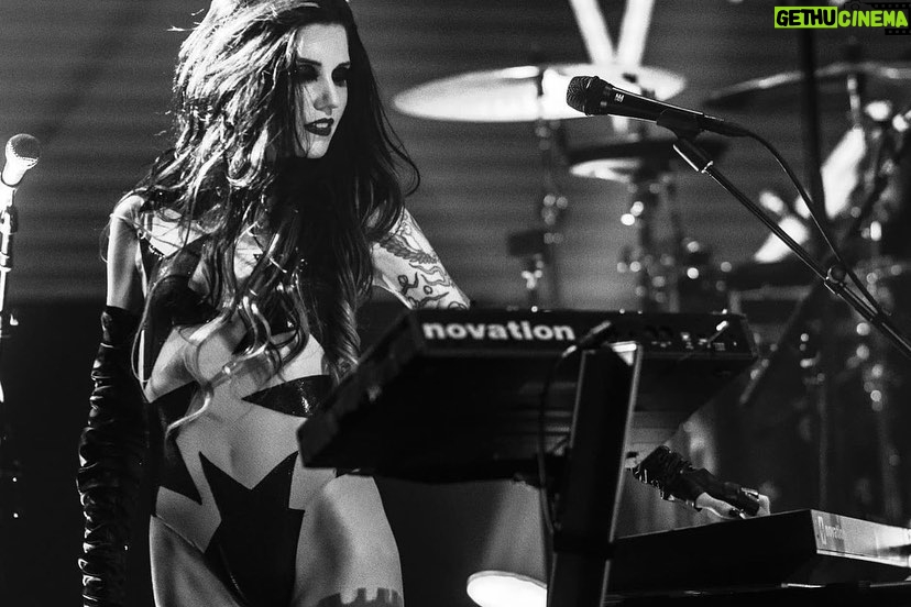 Kat Von D Instagram - A few performance shots from the Love Made Me Do It record release party! 🖤 I’m still buzzing over how good it felt to finally share the stage with my amazing bandmates: @sammidoll @mrpharmacist72 @daveparley @brynnroute! Huge thank you to @officialcharo for introducing us on stage, and to all of our friends + family that came to celebrate with us! This party made me even more excited to go on tour soon and do this in an even bigger way! For tickets, click the link in my bio! Because everyone is asking: My star eye piece was made by @awongolding My dress by: @asanchezfashion My shoes: coven buckle shoes by @vondshoes #lovemademedoit The Belasco
