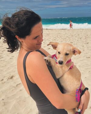 Katie Couric Instagram - Ellie, Carrie and I spent five days in the @turksandcaicos which has become a holiday tradition for us. This year was made even more special because of @potcakeplacek9rescue which takes in stray puppies and dogs and allows visitors to the island to walk them for a couple of hours in the morning. We fell in love with this puppy named ZZ. He came into the shelter in very bad condition—three of his siblings were lost, so the volunteers named the three survivors after BEYONCE—BB, JJ and ZZ.  We thought about bringing ZZ home but we have so much travel planned we ultimately decided against it. Jane Parker-Rauw wrote us the sweetest email. “We get a lot of lovely families through our doors just like yours who want to help and quite often that help doesn’t come in adopting a dog. People can help in so many other ways.” Jane said her goal is to control the population through spay/neuter programs, adoption and education. She goes to schools in her “spare time” and talks about animal welfare. “There is no shelter here in The Turks and Caicos Islands and so all of these pups and dogs are looked after in volunteer homes. We keep them until they get adopted. No exceptions.” She went on to say, “We are 100% financed by donations, be it through financial donations to pay the huge dog food bills, vet bills and to keep the lights on, or by bringing down donations in the way of donated vet supplies, toys, puppy formula, pee pee pads, towels and even newspapers to line the crates.
I used to get excited about a man bringing me flowers.. Now it’s pee pee pads and newspapers. How times change!”
I wanted to take a moment to thank Jane and all the volunteers at Potcake Place (like Abby who was so nice!) for everything they do to help the animals on @turksandcaicos_official. “Nobody can do everything,” Jane wrote, “but everyone can do something.” I will be sending a donation. If you’re in the Turks, stop by and give these puppies a hug and a walk! 🐶 🐕 ❤️