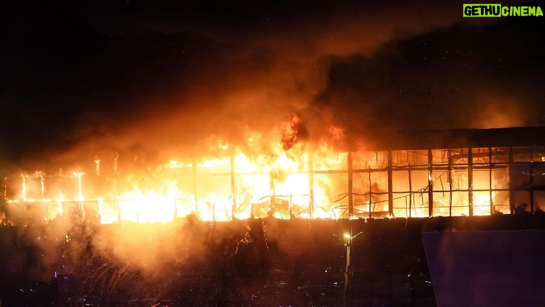 Katie Couric Instagram - 🚨 At least 40 people were killed and more than 100 were injured after armed attackers stormed a popular concert venue complex near Moscow and opened fire, according to preliminary information from the Federal Security Service in Russia, state media TASS reported. The attack is being investigated as a terrorist act, according to Russia’s Investigative Committee. RIA Novosti reported the armed individuals “opened fire with automatic weapons” and “threw a grenade or an incendiary bomb, which started a fire.” State media Russia 24 reported the roof on the venue has partially collapsed. The attack unfolded before the music group Picnic was set to perform, according to Russia 24. A SWAT team was called to the area and more than 70 ambulance teams and doctors were assisting victims. Around 100 people were evacuated from the building by firefighters, TASS reported. Rescuers are still working to get people off the roof, according to the Main Directorate of the Ministry of Emergency Situations of the Russian Federation. Credit: @gettyimages #breakingnews #russia #moscow Moscow, Russia