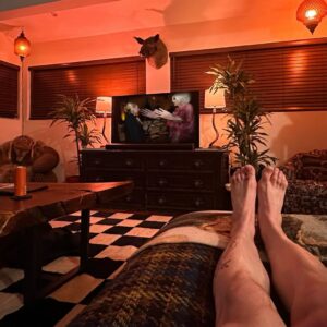 Katya Zamolodchikova Instagram - Grateful for so much this year. The list is endless so let’s stick to what’s pictured. This beautiful couch upholstered by @yangabang this delicious drink created by @bbbbbrandon called @drinkcalexo and this horror movie on the television screen that is sure to give me either nightmares or wet dreams or maybe both. @trixiemattel