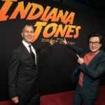 Ke Huy Quan Instagram - Indy will always be a hero to Short Round and Harrison Ford will always be a hero to me❣️ I wish he could continue in this role forever, but I was happy to be there last night to see him crack that whip one more time. Dial of Destiny is SO GOOD!!! Please go see it comes June 30th! (Can you spot another cast member from Temple of Doom? Hint: he loves voodoo dolls 😜) 📸: @gettyimages Styling: @chloekeiko Grooming: @sonialeeartistry Outfit: @paulsmithdesign Glasses: @cutlerandgross Watch: @omega Shoes: @churchs @indianajones @lucasfilm @disney