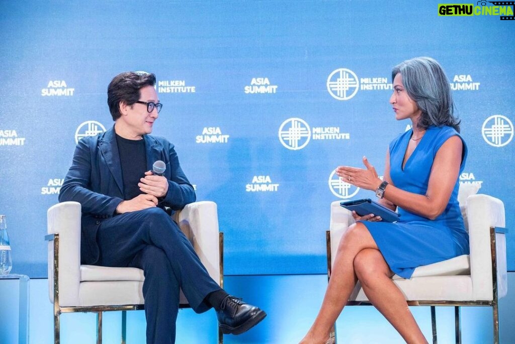 Ke Huy Quan Instagram - It’s quite clear from the expression on my wife's face that she is already sick of me talking about myself. 😂 So, to annoy her even more, I did it for 30 more minutes. 😝 All jokes aside, THANK YOU @milkeninstitute for having me and @sharanjitleyl for the fun conversation. Dressed by: @giorgioarmani Grooming: @sean_livesforcoffee @peterkhor