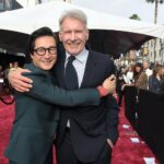 Ke Huy Quan Instagram - Indy will always be a hero to Short Round and Harrison Ford will always be a hero to me❣️ I wish he could continue in this role forever, but I was happy to be there last night to see him crack that whip one more time. Dial of Destiny is SO GOOD!!! Please go see it comes June 30th! (Can you spot another cast member from Temple of Doom? Hint: he loves voodoo dolls 😜) 📸: @gettyimages Styling: @chloekeiko Grooming: @sonialeeartistry Outfit: @paulsmithdesign Glasses: @cutlerandgross Watch: @omega Shoes: @churchs @indianajones @lucasfilm @disney