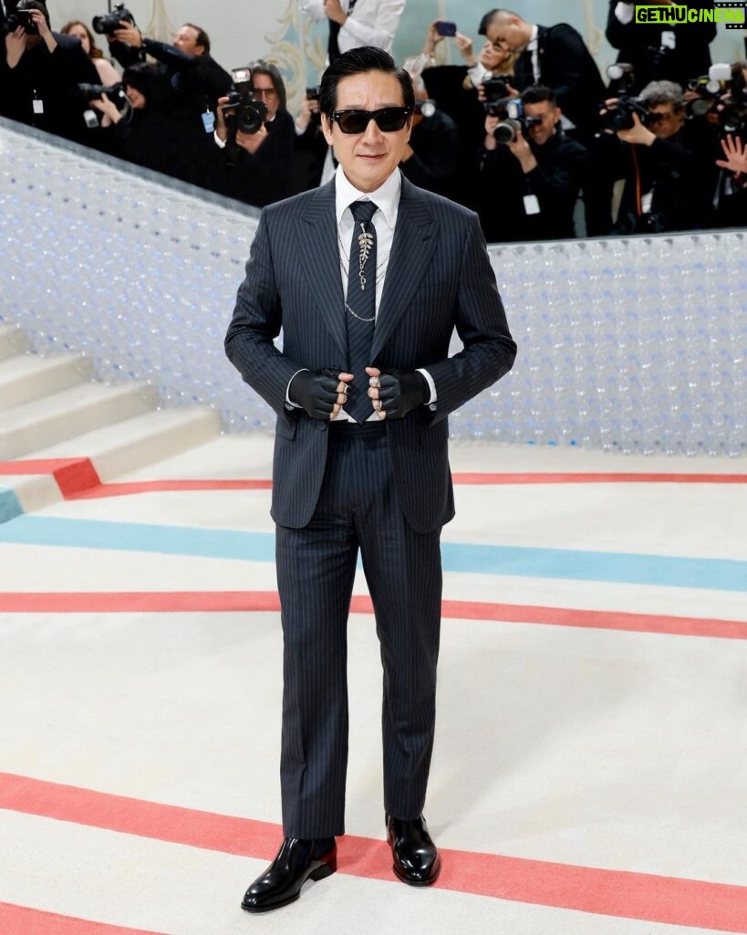 Ke Huy Quan Instagram - Newly awarded Oscar winner @KeHuyQuan attended the #MetGala 2023 in a custom striped suit by @MrKimJones with jeweled fingerless gloves as a tribute to the evening’s theme honoring Karl Lagerfeld. Swipe to see the #DiorSavoirFaire behind the look worn to the @MetCostumeInstitute event. © Photos Savoir-Faire: Sophie Carre Metropolitan Museum of Art (MET)
