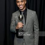Keith Powers Instagram - NAACP Image Awards Dinner ‘24 WE GOT THE DUB! 🏆✨🏆✨🏆✨ I hella appreciate you all for voting. Yal really came through for me! The support is beyond appreciated, from the fam to the fans. Thanks to the NAACP for allowing me to even be nominated alongside these heavy hitters. That was already a win for me, fr. I thank everyone who worked on this film. Numa, Gab and Tommy I really appreciate yal for giving me a shot. I’m forever a work in progress and this acknowledgment is hella motivating and heart warming. Any win of mine is a win for my hometown, 916 wasssshaaaninnnnn!?!?!