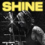 Keith Urban Instagram - It's a massive honor to be inducted into the Nashville Songwriters Hall of Fame next week and I wanted to shine a light on a collection of songs that I've written.   Shine Coming Home I Told You So Somebody Like You Days Go By Gone Tomorrow (Here Today)   I chose SHINE as the first track and for the title of this collection of songs because I think it's what we were all born to do. The song itself is about hope, which has often been a theme I've gravitated towards. It's about trying to help someone else see the best in themselves. I probably write these kinds of songs because not only do I need to hear them, but I need these kinds of people in my own life too. Side note: I write on a lot of different instruments. This one found me on piano and it's me playing on the master !   "Coming Home" follows that theme where 'home' (wherever and whatever that is for each of us) is the place where people really care about you and love you for who you are. It's easy to get lost in the world sometimes, and I think we need some kind of 'center' to keep us balanced. It also samples 'Mama Tried' by Merle Haggard, which will always be badass !!   A recurring theme I write about often is being present and in the moment. For whatever reason, I've usually found uptempo music brings this out in me the most. Songs like "Days Go By" and "Gone Tomorrow (Here Today)" started with the music first, and for me, the music was already telling the story. Seize the day and LIVE !!!!  Listen to SHINE wherever you stream ! link in bio.