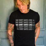Keith Urban Instagram – A huge shoutout to all of the kind hearts at @stjude for everything they do ! #ThisShirtSavesLives and helps to support the kids at St. Jude fighting cancer. Learn more and get your shirt at musicgives.org
