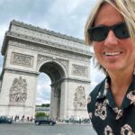 Keith Urban Instagram – So we’re back in Paris 3 years later….and I take what I think is the EXACT same photo (aside from the obvious differences — clothes, etc.)
After I left, I realized what I’d completely overlooked. Classic. If you spot the difference, let me know in the comments ! 🙃
In other news, Brown Eyes Baby is out tonight !!!!!! Paris, France