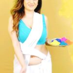Kenisha Awasthi Instagram - Happy Holi- May the year ahead be filled with memories that are vivid and colourful for you all 💞 Check out the FULL Video Link in my IG story 💥 #kenishaawasthi #holisong2023 #holiaayire #festivalofcolours #waterholi #indianfestivals #festivities🎉