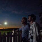 Kevin Costner Instagram - Last week the @mlb gave me a chance to “have a catch” with my son at the Field of Dreams. Joe was just a baby when we made Field of Dreams—a movie ultimately about the relationship between a father and son. It felt completely full circle to share this incredible experience with him.   📸: @caleglendening #MLBatFieldOfDreams