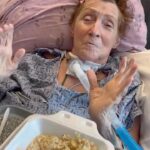 Kevin Smith Instagram – My Mom has been in the hospital over a month now for what has been a harrowing series of medical emergencies that almost took from me and my family the most important and beloved person I’ve ever known. Elevated blood pressure and heart rate brought her in, which the doctors tried to control with drugs and fluids for 2 weeks. That’s when pneumonia crept in to complicate matters. Then Mom complained about a stomach ache, which turned out to be a perforated bowel, requiring emergency surgery to save her life. She was knocked out on Fentanyl for more than a week after that, during which they put 2 stents in her kidneys and gave her a tracheostomy to assist in her labored breathing. But through it all, the 77 year old Amazing Grace fought for life and refused to succumb to her series of physical traumas. Yesterday, after over a month, they finally removed the feeding tube from her nose, putting her a giant step toward getting out and going home. And though it’s resulted in an almost adorable Munhkin-sounding voice, we’re hoping the trach tube gets removed next week, at which point she can be moved to a facility closer to home. Mom has been shockingly strong throughout her terrifying trial, so I had to share her delightful dance (shot by @virginia_in_vienna) celebrating the removal of the tube from her nose! Many thanks to the Floridian health care professionals – both the doctors and the nurses – who’ve worked so hard to keep my Mom on the sunny side of the ground! And while I’ve traveled to and from the Sunshine State tons of times in the last month to be there for and with Grace (including a trip with @harleyquinnsmith), my massive appreciation and all my love go out to my brother Don and my sister Virginia for their constant care and omnipresence at Mom’s bedside. I don’t wanna jinx it, but the prognosis is finally looking good for Mom – who just dreams of being back home with her kitty-cat, Princess. When she’s well enough to travel, you better believe we’re having a celebration for Amazing Grace at @smodcastlecinemas (including a screening of her favorite film, The Sound of Music)! It’s gonna be an extra special Mother’s Day this Sunday! #kevinsmith #mom