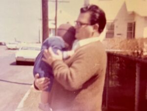 Kevin Smith Instagram - 20 years ago today, my Dad died. So this morning, my brother Don and I took our Mom to church. Shockingly, the roof didn’t cave in on the director of DOGMA. The mass was celebrated in memory of Pop - a man who shaped my life, both literally and figuratively before he left this world. Two decades back, my whole family happened to be in Philadelphia at the same time - so they all came to my #wizardworldphilly Q&A. After the Q&A, we went to dinner at @mortonssteak: @jenschwalbach, me, Dad, Donald, @donsgirlgrace, @virginia_in_vienna & her husband Eric (Don’s husband Jerry was stuck in Florida), where we had the time of our lives for the last time in his life. After a memorable meal with the family he co-created, Dad died in the wee hours of the following morning, June 1, 2003. A portion of his ashes have resided with me since his cremation, as a constant reminder of the quiet patriarch without whom I wouldn’t even exist. My sister has long maintained that I based Silent Bob on Dad - the guy who said very little unless he had something funny or insightful to impart (ironically, that would mean Jay is based on my Mom). I don’t know if I got Silent Bob from Dad, but I got nearly everything else. In the pic of me at the lectern, the bald spot in the front row is my Father - who fed me Standup comedy albums as a kid and loved to watch me talk to a crowd, knowing those records made an impact on his youngest son. While growing up, Dad took me to the movies all the time too - so he likely knew both  my careers as a storyteller came indirectly from his unintentional influence. I’m happy he got to meet @harleyquinnsmith (he was a big fan), but he’s been gone twenty years and I still miss him. So if you can (and if you wanna), hug your Dads for me today, Kids. And if you’re in Toronto on Friday or Jersey on Saturday, come see me at the @sandersoncentrebrantford or @smodcastlecinemas. That sounds like a self-serving plug because it is - but it’s also in memory of a guy who’d still be in the front row watching me if he could. Miss you, Pop. Rest in Power. #KevinSmith #dad #mementomori