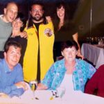 Kevin Smith Instagram – 20 years ago today, my Dad died. So this morning, my brother Don and I took our Mom to church. Shockingly, the roof didn’t cave in on the director of DOGMA. The mass was celebrated in memory of Pop – a man who shaped my life, both literally and figuratively before he left this world. Two decades back, my whole family happened to be in Philadelphia at the same time – so they all came to my #wizardworldphilly Q&A. After the Q&A, we went to dinner at @mortonssteak: @jenschwalbach, me, Dad, Donald, @donsgirlgrace, @virginia_in_vienna & her husband Eric (Don’s husband Jerry was stuck in Florida), where we had the time of our lives for the last time in his life. After a memorable meal with the family he co-created, Dad died in the wee hours of the following morning, June 1, 2003. A portion of his ashes have resided with me since his cremation, as a constant reminder of the quiet patriarch without whom I wouldn’t even exist. My sister has long maintained that I based Silent Bob on Dad – the guy who said very little unless he had something funny or insightful to impart (ironically, that would mean Jay is based on my Mom). I don’t know if I got Silent Bob from Dad, but I got nearly everything else. In the pic of me at the lectern, the bald spot in the front row is my Father – who fed me Standup comedy albums as a kid and loved to watch me talk to a crowd, knowing those records made an impact on his youngest son. While growing up, Dad took me to the movies all the time too – so he likely knew both  my careers as a storyteller came indirectly from his unintentional influence. I’m happy he got to meet @harleyquinnsmith (he was a big fan), but he’s been gone twenty years and I still miss him. So if you can (and if you wanna), hug your Dads for me today, Kids. And if you’re in Toronto on Friday or Jersey on Saturday, come see me at the @sandersoncentrebrantford or @smodcastlecinemas. That sounds like a self-serving plug because it is – but it’s also in memory of a guy who’d still be in the front row watching me if he could. Miss you, Pop. Rest in Power. #KevinSmith #dad #mementomori