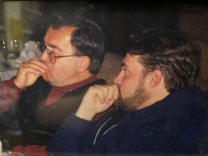 Kevin Smith Instagram - 20 years ago today, my Dad died. So this morning, my brother Don and I took our Mom to church. Shockingly, the roof didn’t cave in on the director of DOGMA. The mass was celebrated in memory of Pop - a man who shaped my life, both literally and figuratively before he left this world. Two decades back, my whole family happened to be in Philadelphia at the same time - so they all came to my #wizardworldphilly Q&A. After the Q&A, we went to dinner at @mortonssteak: @jenschwalbach, me, Dad, Donald, @donsgirlgrace, @virginia_in_vienna & her husband Eric (Don’s husband Jerry was stuck in Florida), where we had the time of our lives for the last time in his life. After a memorable meal with the family he co-created, Dad died in the wee hours of the following morning, June 1, 2003. A portion of his ashes have resided with me since his cremation, as a constant reminder of the quiet patriarch without whom I wouldn’t even exist. My sister has long maintained that I based Silent Bob on Dad - the guy who said very little unless he had something funny or insightful to impart (ironically, that would mean Jay is based on my Mom). I don’t know if I got Silent Bob from Dad, but I got nearly everything else. In the pic of me at the lectern, the bald spot in the front row is my Father - who fed me Standup comedy albums as a kid and loved to watch me talk to a crowd, knowing those records made an impact on his youngest son. While growing up, Dad took me to the movies all the time too - so he likely knew both  my careers as a storyteller came indirectly from his unintentional influence. I’m happy he got to meet @harleyquinnsmith (he was a big fan), but he’s been gone twenty years and I still miss him. So if you can (and if you wanna), hug your Dads for me today, Kids. And if you’re in Toronto on Friday or Jersey on Saturday, come see me at the @sandersoncentrebrantford or @smodcastlecinemas. That sounds like a self-serving plug because it is - but it’s also in memory of a guy who’d still be in the front row watching me if he could. Miss you, Pop. Rest in Power. #KevinSmith #dad #mementomori