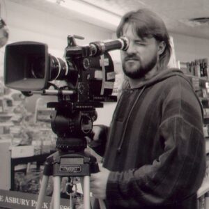 Kevin Smith Instagram - HAPPY CLERKS DAY! 30 years ago from today, CLERKS debuted at the 1994 Sundance Film Festival! That means, if you ever wanted to stop me or my career from happening, youʼd send a Terminator back to this moment in time 3 decades back. Mercifully, there was no robotic hunter/killer trying to kill me at Sundance that year. The inaugural screening took place at the Holiday Village Cinema in a sold out 150 seater. That was the first time I got to see my first film with a full audience. The sheer thrill of finding out that ideas Iʼd had years prior actually held up to public scrutiny from strangers was intoxicating (but that also might have had something to do with the thin air at the high altitude). That first screening started the buzz that powered the next three screenings and a deluge of press about the black and white New Jersey convenience store movie and the director who was going back to work there after the Festival ended. By our fourth and final Sundance screening at The Egyptian Theater on Main Street in Park City, Clerks was being talked about and written about like it was well worth watching. As he introduced me and the film, Festival head Geoff Gilmore described me in a way that still gets me in the feels when he said “If Kevin Smith didnʼt exist, the Sundance Film Festival wouldʼve had to invent him.” Mine was a Cinderella-ish or Rocky-like tale that reminded folks anyone can take a shot at their dreams and maybe find a modicum of success - even if theyʼre from New Jersey. Do you have a dream (one that doesnʼt involve hurting people or animals, destruction or death)? 2024 is the year you move closer to your goal and take your shot on yourself. Many thanks to Brian, Jeff, Jay, Marilyn, Lisa, Scott, Dave, Kim, Virginia, Donald, Mom, Dad, the Thapars, and everyone else who helped me craft Clerks! Many thanks to Sundance, Mark Tusk, Bob Hawk and John Pierson for guiding a gobsmacked newcomer in his sudden success. And many thanks to you, my friends, for 30 years of continued interest in the Askewniverse adventures of retailing rascals Head over to JayAndSilentBob dot com TODAY to shop our anniversary sales! #KevinSmith #clerks #film