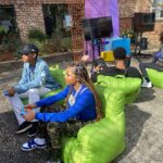 Khamyra Sykes Instagram - It was EVERYTHING for me @essencegu_ @essence . The GU summit ate w/ powerful, beautiful and inspirational baddies. Thank you #gusummit for inviting me💜 Thank you @cxmmunity.co for having me Host the dopest Gaming Tournament 🎮we were 🔥til the 🌧️ shut us down… Atlanta, Georgia