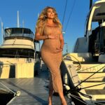 Khloë Terae Instagram - every sunset brings me closer to meeting you ✨ 🌊 @fashionnova Katalina rhinestone mesh maxi dress size medium Marina del Rey, California