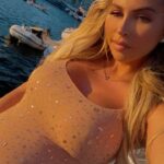 Khloë Terae Instagram - every sunset brings me closer to meeting you ✨ 🌊 @fashionnova Katalina rhinestone mesh maxi dress size medium Marina del Rey, California