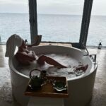 Khloë Terae Instagram - pretty insane how much your life can change in a year 🛁 🫧 ready for what’s coming while being grateful for every moment it took to get me here 🤍✨🌊 Raffles Maldives Meradhoo