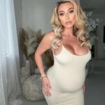 Khloë Terae Instagram - This comfy dress hugs all my curves in the right places! 🫶🏼 @fashionnova “Ajay maxi dress in ivory” wearing Medium #novababe