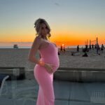 Khloë Terae Instagram - Golden hour is our favorite time of day @fashionnova 🌞 featured items in size medium: Ajay maxi dress in sand & pink too hot to handle puffer jacket in camel #sunsetlover #fashionnova #ad Hermosaa Beachh.<3