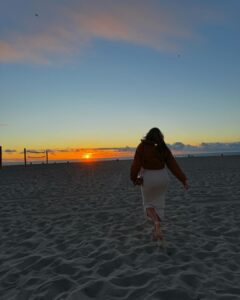 Khloë Terae Instagram - Golden hour is our favorite time of day @fashionnova 🌞 featured items in size medium: Ajay maxi dress in sand & pink too hot to handle puffer jacket in camel #sunsetlover #fashionnova #ad Hermosaa Beachh.<3