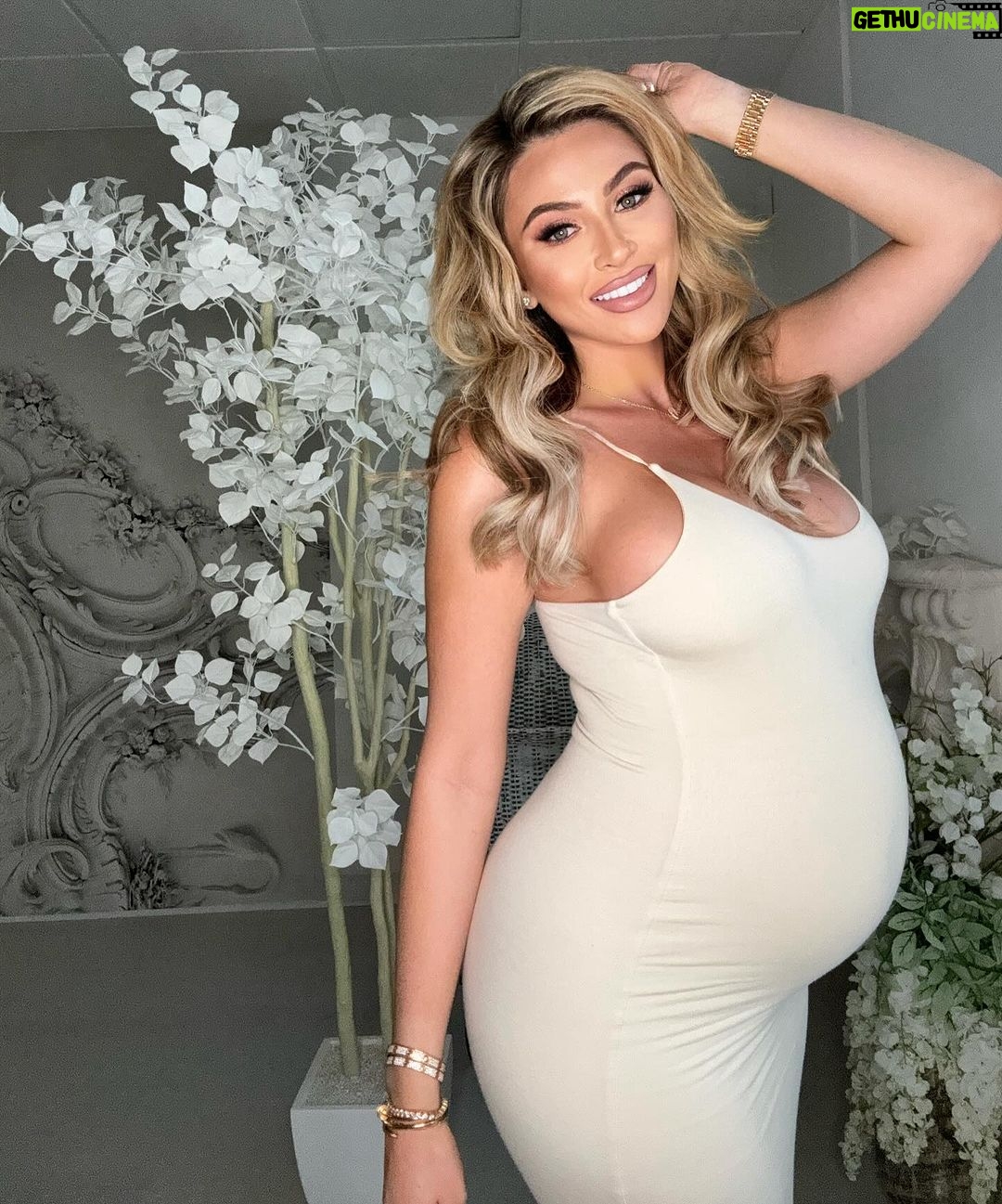 Khloë Terae Instagram - This comfy dress hugs all my curves in the right places! 🫶🏼 @fashionnova “Ajay maxi dress in ivory” wearing Medium #novababe