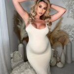 Khloë Terae Instagram - This comfy dress hugs all my curves in the right places! 🫶🏼 @fashionnova “Ajay maxi dress in ivory” wearing Medium #novababe