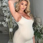 Khloë Terae Instagram - This comfy dress hugs all my curves in the right places! 🫶🏼 @fashionnova “Ajay maxi dress in ivory” wearing Medium #novababe