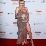 Khloë Terae Instagram - Ocean’s first red carpet! Had to come out (for a quick) red carpet spin and donation for @babesintoylandcharity benefiting the @themidnightmission 🎀 🎁 🎄 6 months pregnant on the red carpet! ✨ Glam @makeupgayane1 Skin @beautyatthebayrb Hair @peterhairbh Gown @abyssbyabby Images @twistimages