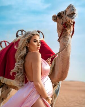 Khloë Terae Instagram - only 100 days until I get to hold you in my arms 🎀 🐪 🤍

#26weeks #100daysleft #pregnancy #dubai 

Dress @santorinidress 
Hair & Makeup @sota.salon x @sotahair