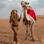 Khloë Terae Instagram - Arabian nights, like Arabian days 🐪 🏜️ 🫶🏼 @fashionnova “A Stroll With Me Maxi Dress - Mocha” You can have it too... 🤎🤎🤎 Shop @FashionNova CYBER MONDAY 50-95% Off Absolutely EVERYTHING! #AD Dubai, United Arab Emirates