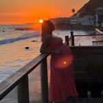 Khloë Terae Instagram - Counting down the hours 💕☀️🌊 @fashionnova wearing penelope maxi dress in coral size medium 🎀 Malibu, California