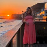 Khloë Terae Instagram - Counting down the hours 💕☀️🌊 @fashionnova wearing penelope maxi dress in coral size medium 🎀 Malibu, California