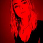 Kiernan Shipka Instagram - enjoying the red sun filter