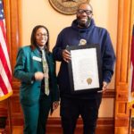 Killer Mike Instagram - Thank you Georgia state representative @imani4ga for the proclamation and honors you presented me. Everything I do, I do as a proud Georgian to have this validation from my home state is an immense honor. Having my kindergarten teacher, Ms. Pritchett, there made this moment extra sweet. Thank you @theatlantavoice for the fantastic write up. 🙏🏽 ☦️ #MICHAEL