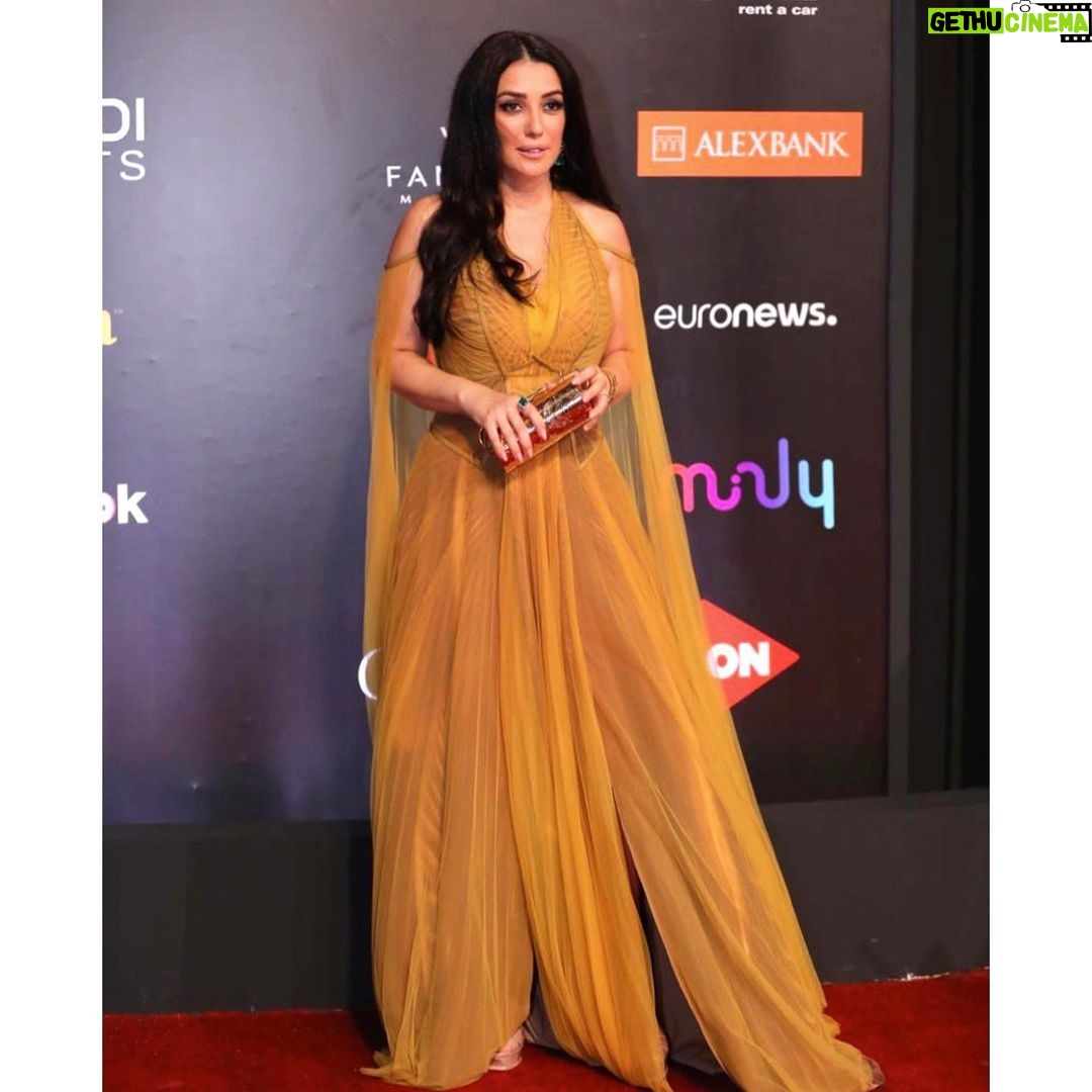 Kinda Alloush - 109.3K Likes - 💛💛💛💛
@elgounafilmfestivalofficial #gff20
Styling by @yasmineeissa
Dress by @hassidrissofficial
Makeup @by_maiayman
Jewelery by @dimajewellery
Photography @mongiphg
Clutch by @okhtein
Hairdresser @haithamdahab00 represented by
@mad_solutions