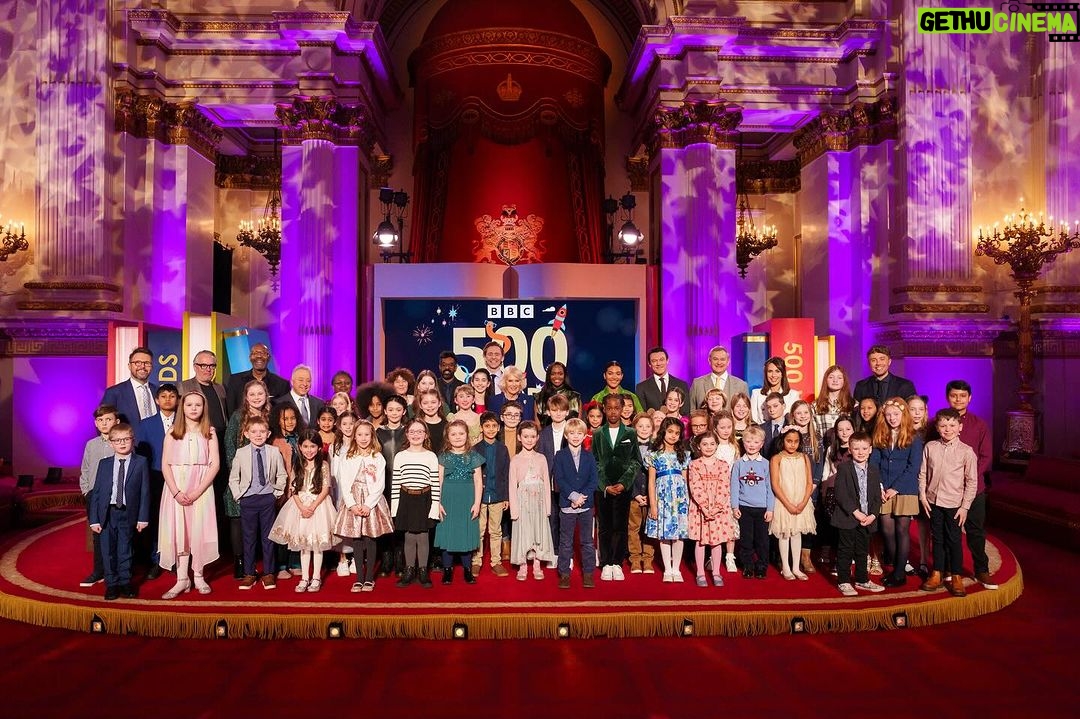 King Charles III of the United Kingdom Instagram - Celebrating young writers at the #500Words Grand Final 📚 The 50 finalists of the UK’s most celebrated children’s writing competition gathered at Buckingham Palace for an exclusive reception with Her Majesty, The Queen. The six outstanding winners were announced in a ceremony presented by Romesh Ranganathan and attended by a host of celebrity readers. The winners will be revealed in a special episode of #TheOneShow on #WorldBookDay, Thursday March 7 🗓️