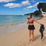 Kira Kosarin Instagram - happy NYE from me & the the many puppies of Barbados I may or may not be trying to figure out how to take home in my suitcase 🌴☀️🇧🇧 Barbados, Caribbean