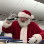 Kira Kosarin Instagram - happy chrimbo from me, the giant polar bear, airplane santa, banana, max, and ellie bellie