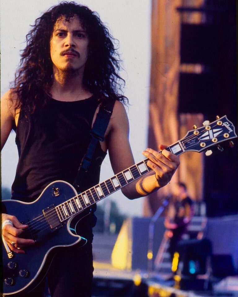 Kirk Hammett Instagram - This black 1989 Les Paul Custom is actually the first Les Paul I ever played live on stage and on tour. I got it when we were on the And Justice For All tour, specifically for “Fade To Black” because I really wanted that big, fat, creamy Les Paul sound for the intro. I loved how fast the neck was and after my tech modified a bunch of the hardware, making it “none more black”, it ended up being a great live metal guitar. It’s a very dependable and reliable guitar, and I used it for decades.  I hope you all will enjoy it as much as I did! Photo📸by @rosshalfin Now, the Gibson Custom Shop has meticulously recreated the the Kirk Hammett 1989 Les Paul Custom.   To learn more about this versatile guitar head over to @gibsoncustom and click the link in their bio.   #gibson #gibsoncustom #kirkhammett #lespaulcustom