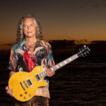 Kirk Hammett Instagram - We are thrilled to introduce the new Epiphone Inspired by Gibson Custom Shop @kirkhammett “Greeny” 1959 Les Paul Standard, built upon the legendary original and debuting for the first time on a core model, a Gibson-Style “open book” headstock. “Greeny” is famous for both its incredible story and its iconic sound. Originally owned by Peter Green, Greeny was used throughout his time with Fleetwood Mac and started as a bright cherry red sunburst, but after countless shows, it faded to a pale yellow color. Its distinctive sound is partly from the out-of-phase middle switch position due to the neck pickup’s reversed magnetic polarity. In the 1970s, Peter sold Greeny to Gary Moore, who used it for three decades with Thin Lizzy and as a solo artist, even recording an album titled “Blues for Greeny.” After years together, Greeny was sold and temporarily retired, left waiting for a chance to return to the stage. Enter Kirk Hammett. Kirk is no stranger to the pursuit of the perfect guitar, but in the case of Greeny, it was as if this guitar was destined for him. It took all of 30 seconds of playing for Kirk to understand the magic. Now owned by Kirk Hammett, Greeny has officially passed through the hands of three legendary guitarists. Now YOU can wield the magic of “Greeny!” head to the link bio to join the list of legends. 📸: @rosshalfin #epiphone #foreverystage #kirkhammett #greeny #lespaul
