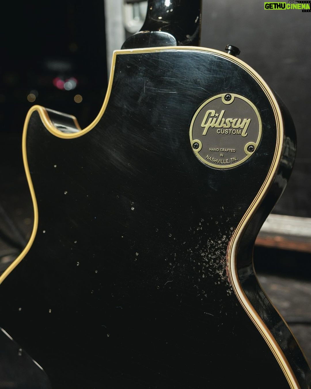 Kirk Hammett Instagram - Kirk Hammett’s sleek “blacked-out” 1989 Gibson Les Paul Custom stands out as the enduring favorite in his lineup – the guitar that’s been a steadfast companion throughout his career. This particular guitar has evolved through several modifications, earning its status as Kirk’s go-to for both recording and touring, and is a mainstay in his arsenal. Now, the Gibson Custom Shop has meticulously recreated this beloved instrument. Introducing the Kirk Hammett 1989 Les Paul Custom. Like the original, the Kirk Hammett 1989 Les Paul Custom features all-black hardware, and per Kirk’s wishes, it comes equipped with uncovered T-Type pickups, along with a Fishman Powerbridge piezo bridge pickup system with a Fishman Powerchip preamp and volume control that bring simulated full-bodied acoustic tone to this versatile Les Paul Custom. Artfully aged by the Murphy Lab to match the look and feel of Kirk’s original 1989 Les Paul Custom, it is a fitting tribute to a metal guitar master and one of his favorite instruments. To learn more about this versatile guitar capable of producing the heavy tones Kirk is known for while also allowing for delicate and full-bodied acoustic tones - head to Gibson.com or click the link in our bio. #gibson #gibsoncustom #kirkhammett #lespaulcustom