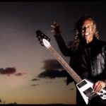 Kirk Hammett Instagram - To Metal Fans, the Kirk Hammett 1979 Flying V needs no introduction, but for all you other gals and guys...this famed guitar was used on Metallica’s seminal metal albums: Kill ‘Em All, Ride the Lightning, Master of Puppets, ...And Justice for All, AND The Black Album. Now, this iconic Flying V is available to haunt every stage with the addition of the Kirk Hammett 1979 Flying V in Ebony and Purple Metallic to the core Epiphone lineup. Conjure the spirit of Kirk Hammett with this killer new model. Head to the link in our bio to get yours now! A meticulous recreation of Kirk’s prized original, this guitar features a mahogany body, a one-piece mahogany neck with volute, Grover Rotomatic machine heads with “spade” buttons, and a custom bridge. The electronics are also top-notch, with a pair of Gibson USA Calibrated T-Type humbucker pickups wired to CTS potentiometers and an Orange Drop capacitor, and a Switchcraft 3-way pickup selector toggle switch and 1/4” output jack. A Kirk Hammett logo adorns the rear of the headstock, and a black hardshell case with a red plush interior is also included. #epiphone #foreverystage #kirkhammett #1979flyingv