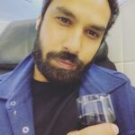 Kunal Nayyar Instagram - “Somewhere over the Atlantic.” A quick sip of wine without the mask;) and snuck a selfie… Prague here I come. Can’t wait to get going. Love. Love. Love. @netflix #Prague